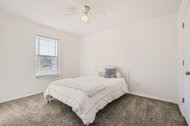 338 Liberty St, Hutto, TX 78634 - bedroom featuring baseboards, a ceiling fan, and carpet floors