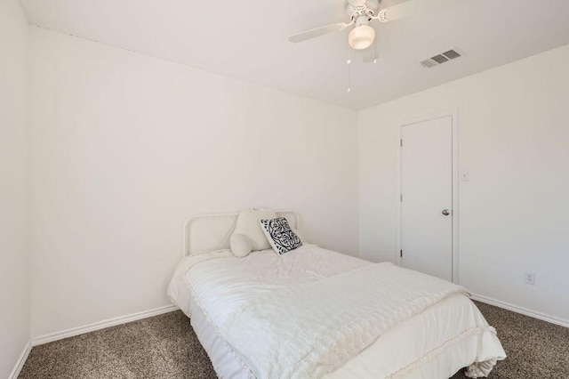 338 Liberty St, Hutto, TX 78634 - carpeted bedroom with baseboards, a ceiling fan, and visible vents