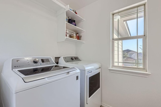 338 Liberty St, Hutto, TX 78634 - washroom with washing machine and clothes dryer and laundry area