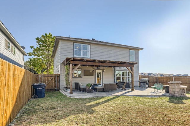 338 Liberty St, Hutto, TX 78634 - rear view of property with an outdoor living space, a yard, a patio, and a fenced backyard
