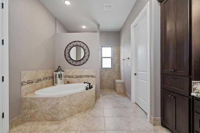full bath with recessed lighting, walk in shower, visible vents, a bath, and tile patterned flooring