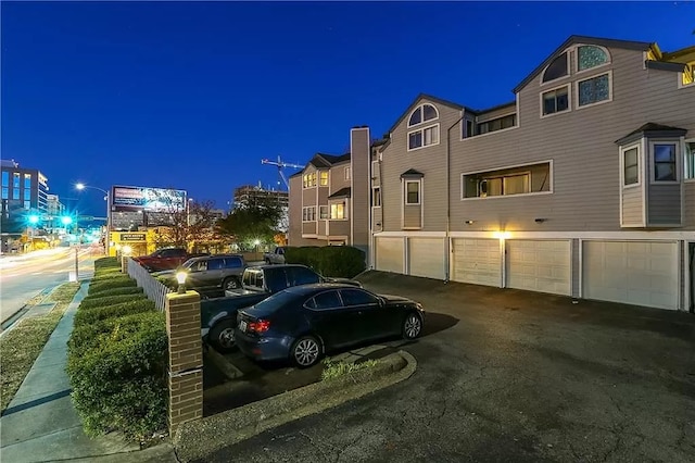 view of front of house featuring an attached garage and driveway