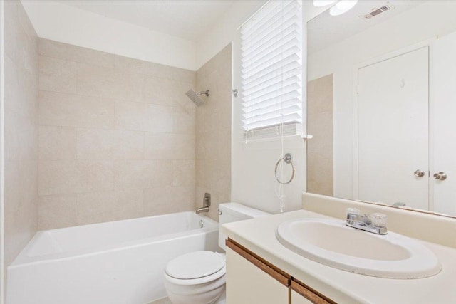 1015 E Yager Ln Unit 157, Austin, TX 78753 - bathroom with toilet, vanity, and  shower combination