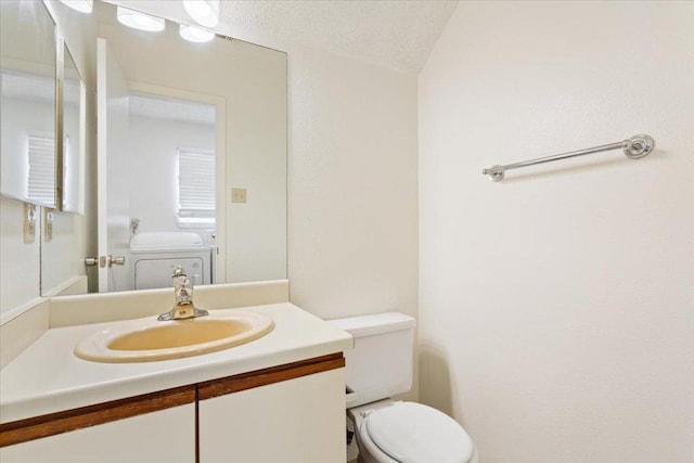 1015 E Yager Ln Unit 157, Austin, TX 78753 - half bathroom featuring toilet and vanity