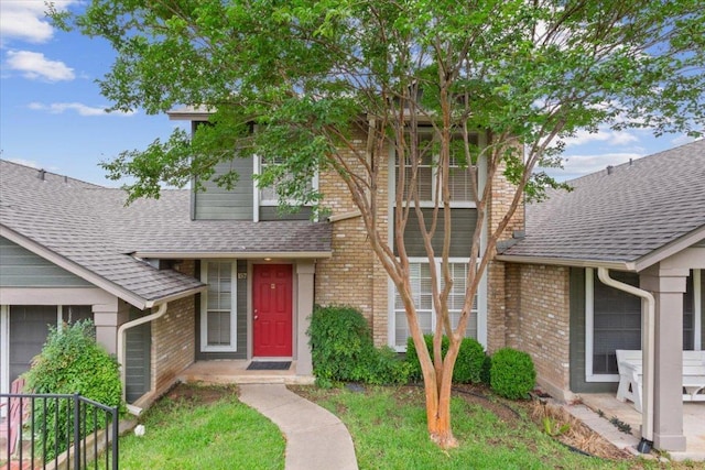 1015 E Yager Ln Unit 157, Austin, TX 78753 - view of front of property with brick siding and roof with shingles