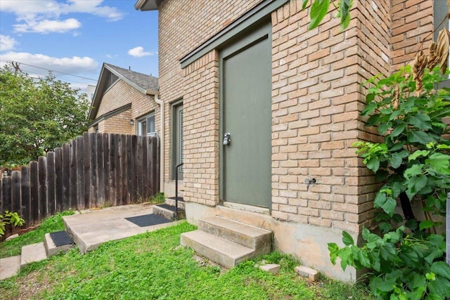 1015 E Yager Ln Unit 157, Austin, TX 78753 - property entrance featuring brick siding