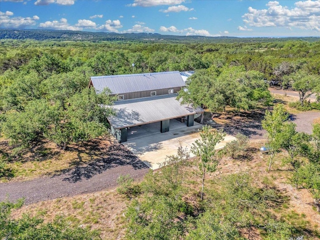 aerial view with a wooded view