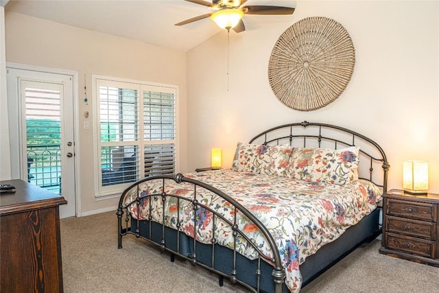 bedroom with a ceiling fan, vaulted ceiling, carpet, and access to exterior