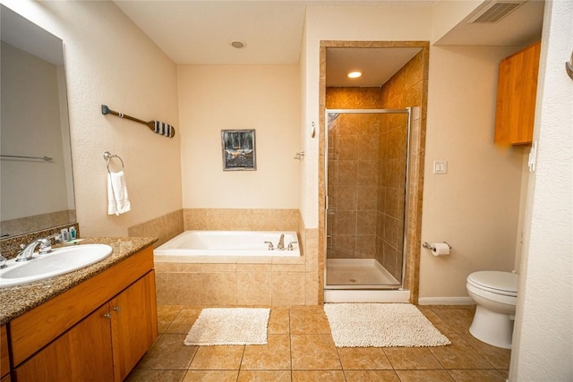 full bath featuring tile patterned flooring, toilet, a shower stall, and a bath
