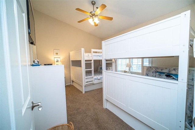 carpeted bedroom featuring vaulted ceiling