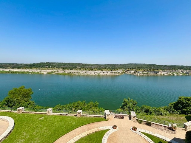 view of water feature with fence