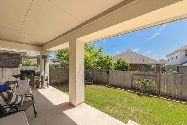 view of patio / terrace featuring a fenced backyard and area for grilling