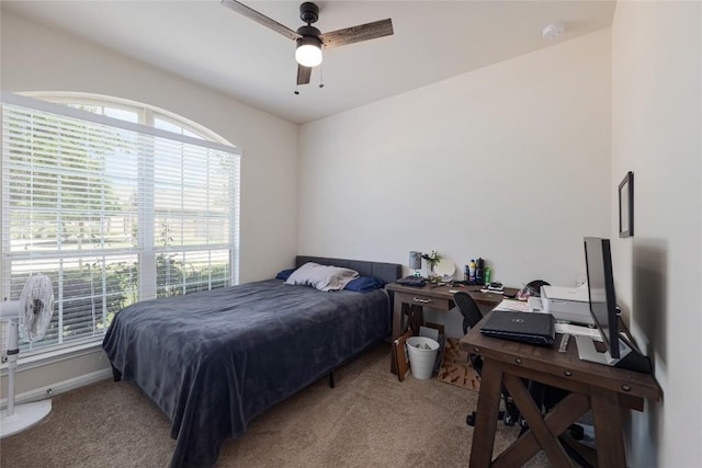 bedroom featuring carpet flooring and a ceiling fan