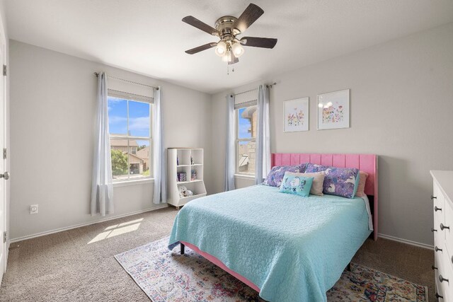 314 Andele Way, Liberty Hill, TX 78642 - bedroom featuring baseboards, ceiling fan, and carpet floors