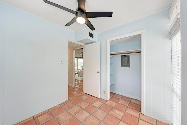 8130 Joy Rd, Volente, TX 78641 - unfurnished bedroom with multiple windows, visible vents, a ceiling fan, and a closet