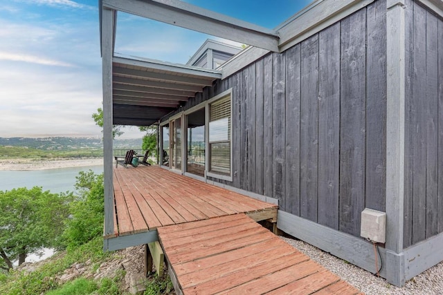 8130 Joy Rd, Volente, TX 78641 - wooden terrace featuring a water view