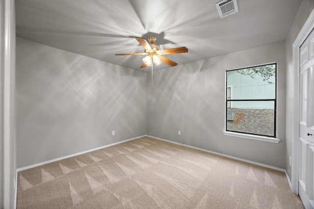 13105 Lubbock Ln, Austin, TX 78729 - carpeted empty room with a ceiling fan and baseboards