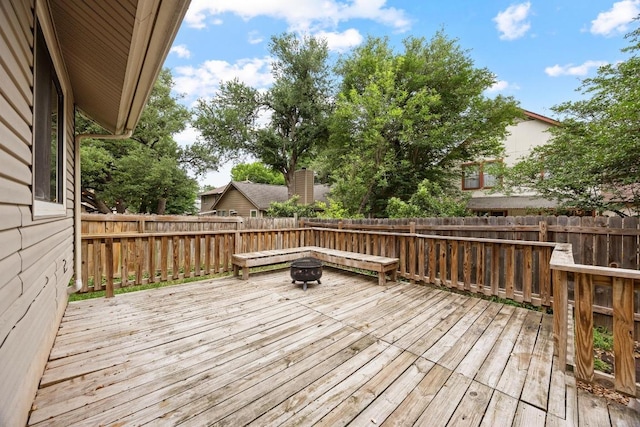 13105 Lubbock Ln, Austin, TX 78729 - deck featuring an outdoor fire pit