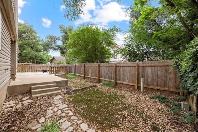 13105 Lubbock Ln, Austin, TX 78729 - fenced backyard featuring a patio area