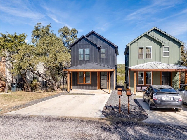294 Shady Bluff Dr, Wimberley, TX 78676 - view of front of home featuring board and batten siding, a porch, and metal roof