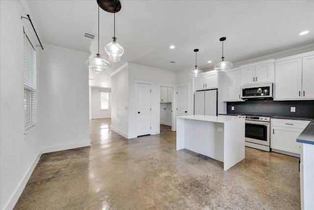 294 Shady Bluff Dr, Wimberley, TX 78676 - kitchen with white cabinets, crown molding, visible vents, baseboards, and appliances with stainless steel finishes