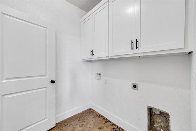 294 Shady Bluff Dr, Wimberley, TX 78676 - clothes washing area featuring electric dryer hookup, washer hookup, cabinet space, and baseboards