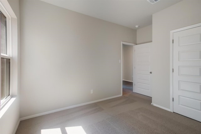 2428 Ambling Trl, Georgetown, TX 78628 - unfurnished bedroom featuring carpet flooring and baseboards