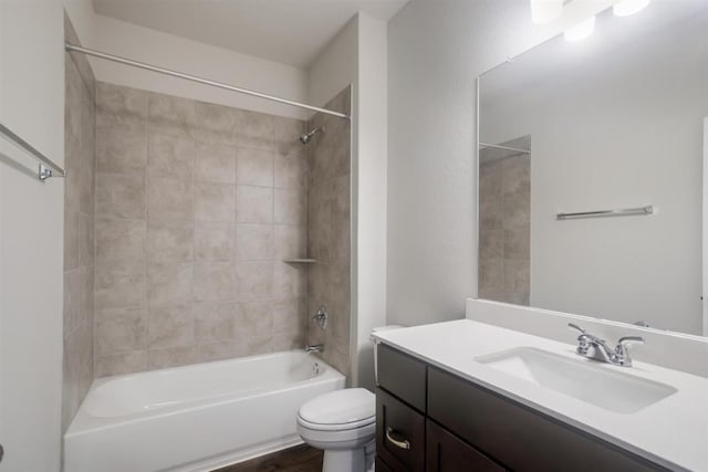 full bathroom featuring vanity, toilet, and tub / shower combination