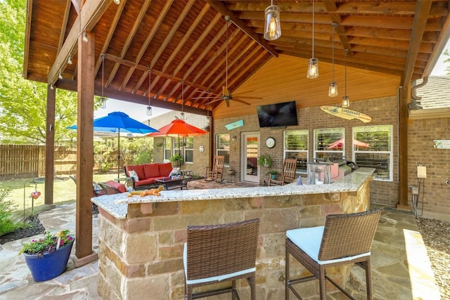 152 Florenz Ln, Georgetown, TX 78628 - view of patio with outdoor dry bar, an outdoor hangout area, and fence