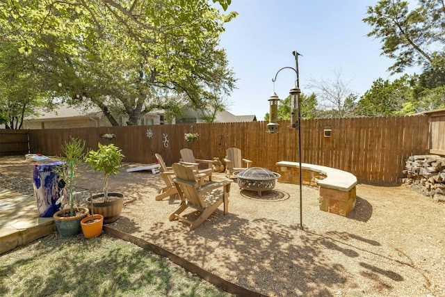 152 Florenz Ln, Georgetown, TX 78628 - view of patio / terrace featuring a fire pit and fence
