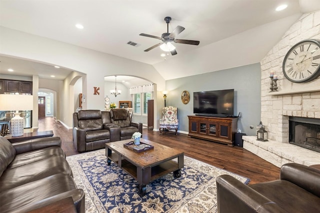 152 Florenz Ln, Georgetown, TX 78628 - living room featuring lofted ceiling, visible vents, ceiling fan, a wealth of natural light, and arched walkways