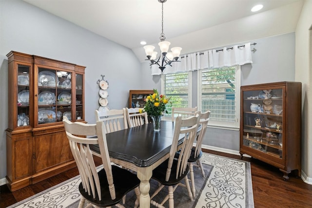 152 Florenz Ln, Georgetown, TX 78628 - dining room with recessed lighting, vaulted ceiling, an inviting chandelier, dark wood-style floors, and baseboards