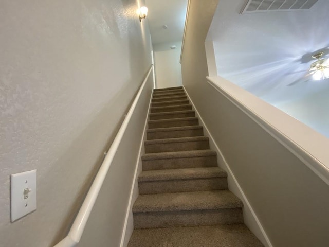 330 Mistletoe Ln, Kyle, TX 78640 - stairway featuring visible vents