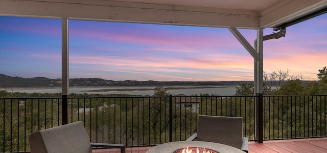 6714 Mtn Trl, Austin, TX 78732 - deck with a water view and an outdoor fire pit