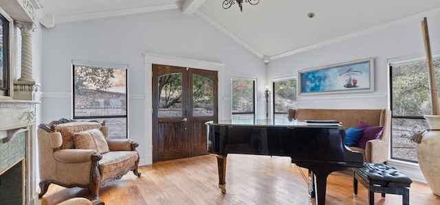 6714 Mtn Trl, Austin, TX 78732 - sitting room with light wood-type flooring, plenty of natural light, ornamental molding, beam ceiling, and high vaulted ceiling