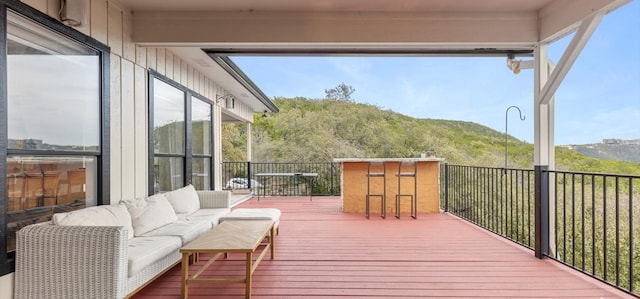 6714 Mtn Trl, Austin, TX 78732 - wooden deck with outdoor lounge area and a mountain view