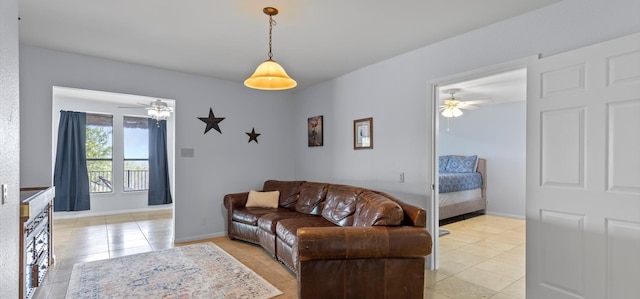 6714 Mtn Trl, Austin, TX 78732 - living room with a ceiling fan and light tile patterned floors