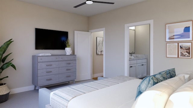 532 Bauer Loop, Liberty Hill, TX 78642 - bedroom with ensuite bath, baseboards, carpet floors, and a sink