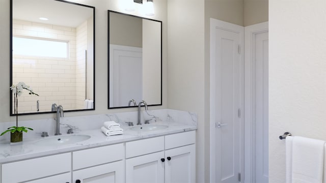 532 Bauer Loop, Liberty Hill, TX 78642 - full bathroom with a closet, double vanity, and a sink