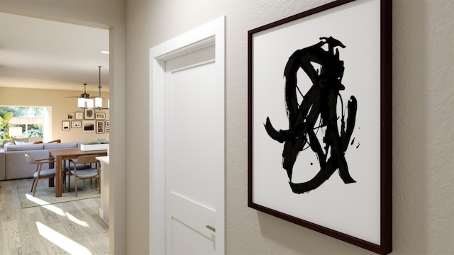 hallway featuring light wood-style flooring