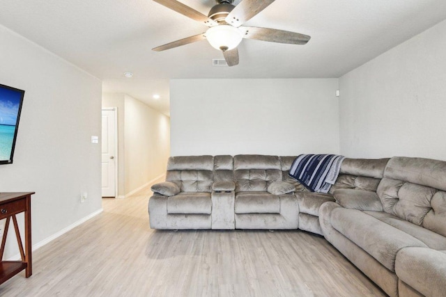 519 Mallow Dr, New Braunfels, TX 78130 - living room featuring a ceiling fan, baseboards, visible vents, and wood finished floors