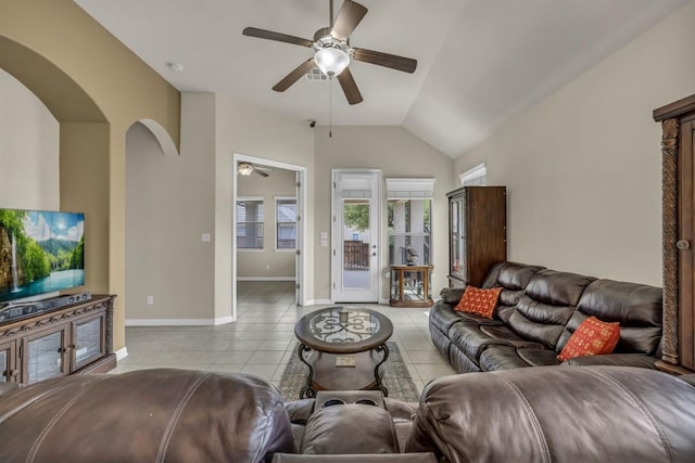 3821 Tordera Dr, Austin, TX 78738 - living area with light tile patterned floors, baseboards, ceiling fan, vaulted ceiling, and arched walkways