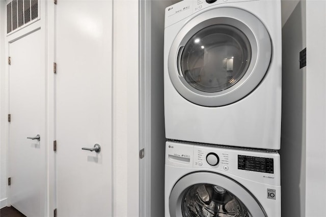 900 S 1st St S Unit 404, Austin, TX 78704 - washroom with stacked washer / dryer