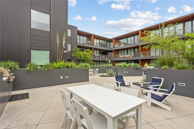view of patio with outdoor dining area
