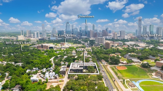900 S 1st St S Unit 404, Austin, TX 78704 - aerial view of property's location with property parcel outlined and skyline