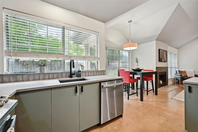 3108 Jubilee Trl, Austin, TX 78748 - kitchen with lofted ceiling, stainless steel dishwasher, a sink, finished concrete floors, and light countertops