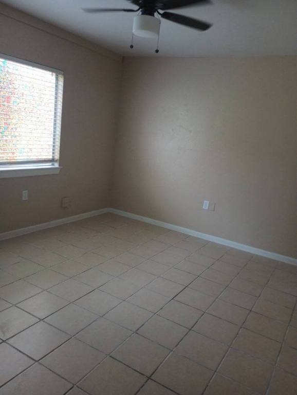 8730 Meadow Song, Converse, TX 78109 - unfurnished room with ceiling fan and baseboards