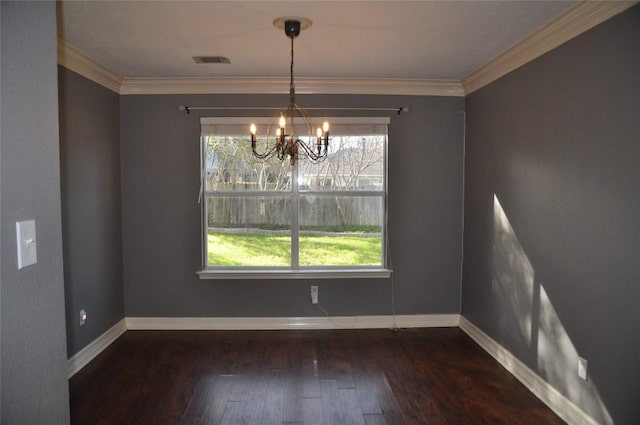 unfurnished dining area featuring a chandelier, hardwood / wood-style flooring, baseboards, and visible vents