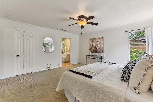 bedroom featuring ceiling fan, visible vents, ornamental molding, and light carpet