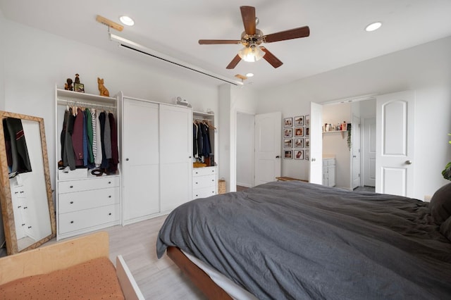 800 Totis Rd, Austin, TX 78748 - bedroom with light wood-type flooring, recessed lighting, and a ceiling fan